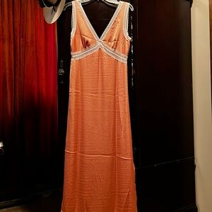 Elegant Lace Trimmed Coral Sleeveless Maxi with Dual Slits to knee